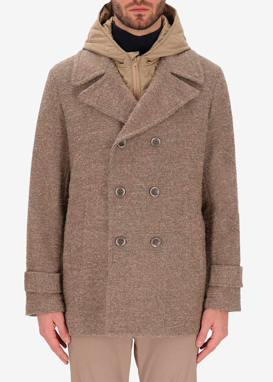 An image of a model wearing Distretto12 peacoat Bicerin in Dove Grey, with a Dove Grey hood.