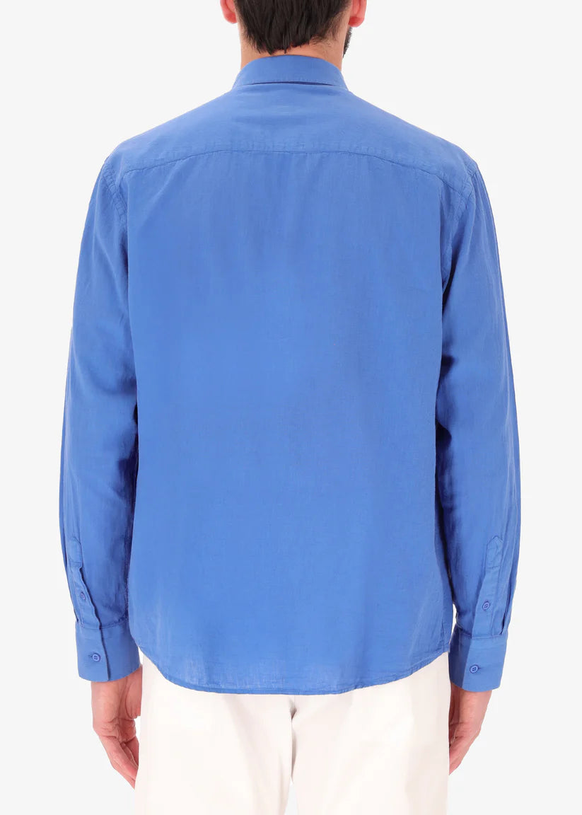 A back facing image of a model wearing a linen blend shirt in blue from Distretto 12.