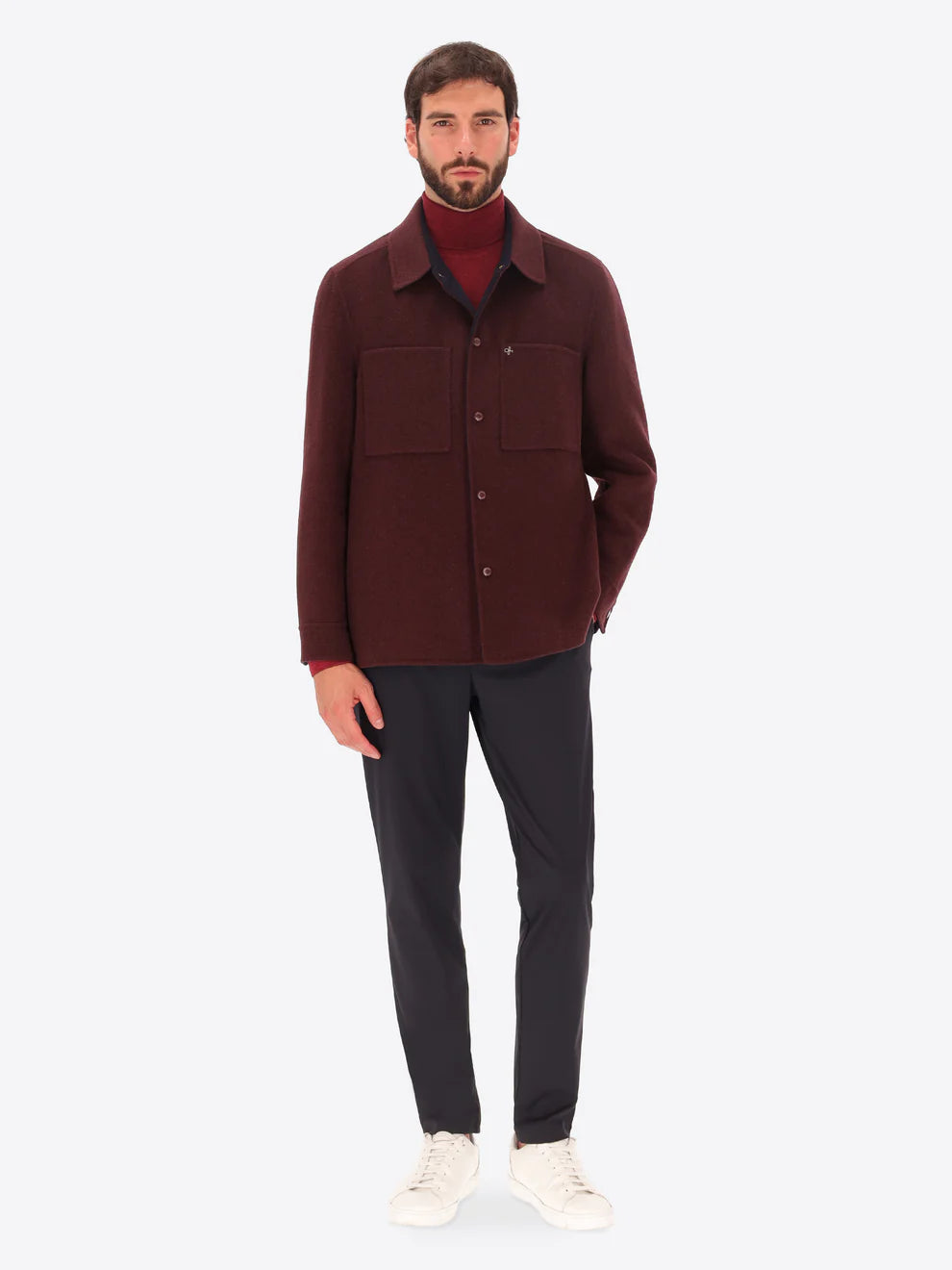Male model wearing maroon collared coat by distretto12 with navy trousers