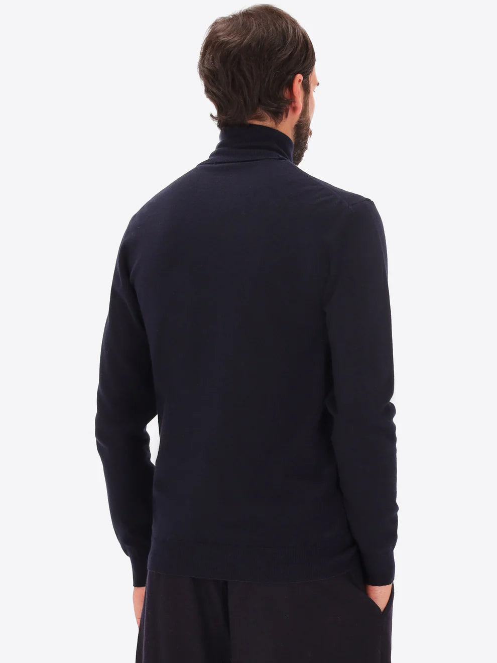 Male model wearing high neck knitwear by distretto12 in navy with back view