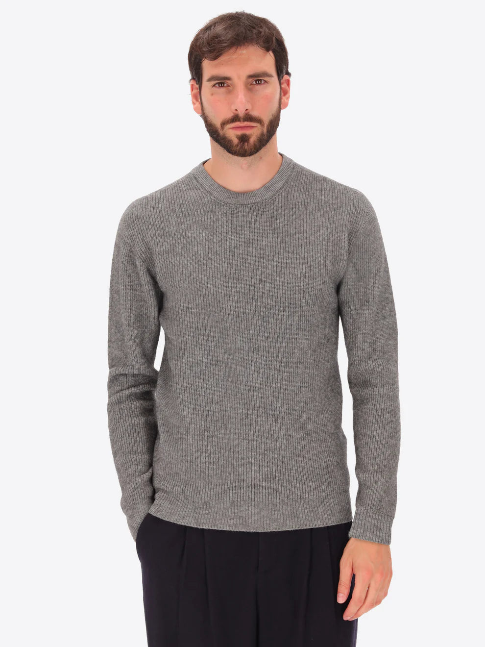Male model wearing ribbed crew neck knitwear by distretto12 in grey