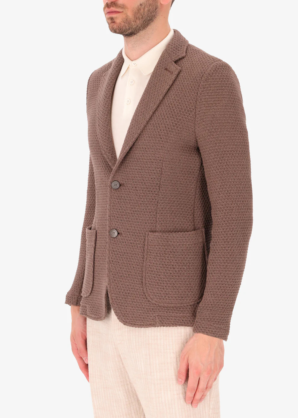A side facing image of a model wearing Distretto 12 Jacket Pit.