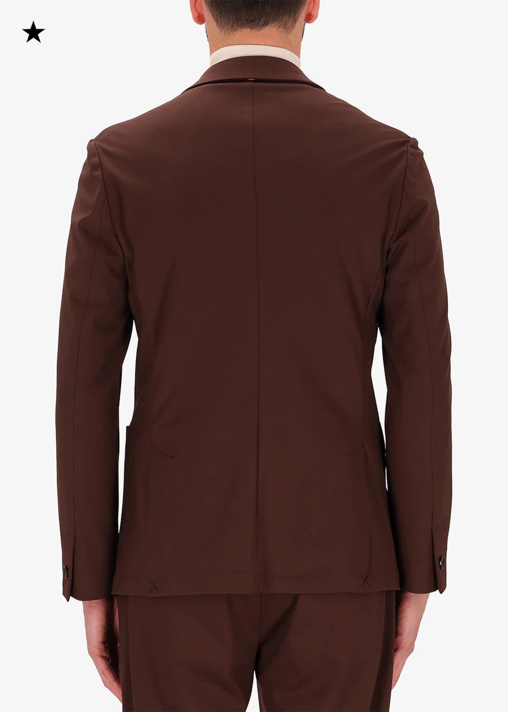 A back facing image of a model wearing double breasted jacket High Performance in brown from Distretto 12.