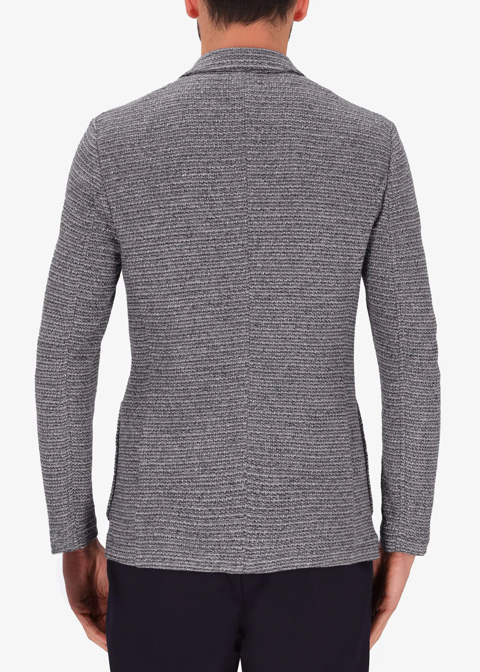 A back facing image of a model wearing Distretto 12 Jacket riff.