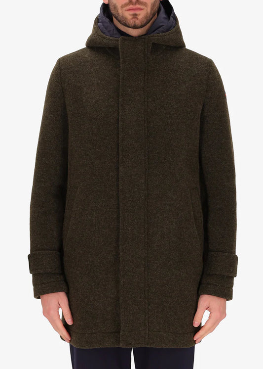 An image of a model wearing Distretto12 parka coat Valentino in Tobacco, with a blue hood.