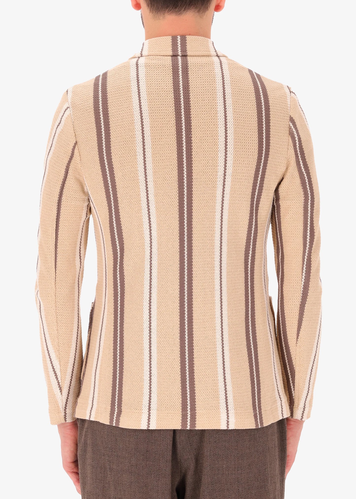 A back facing picture of a model wearing a striped knitted double breasted blazer from Distretto 12.