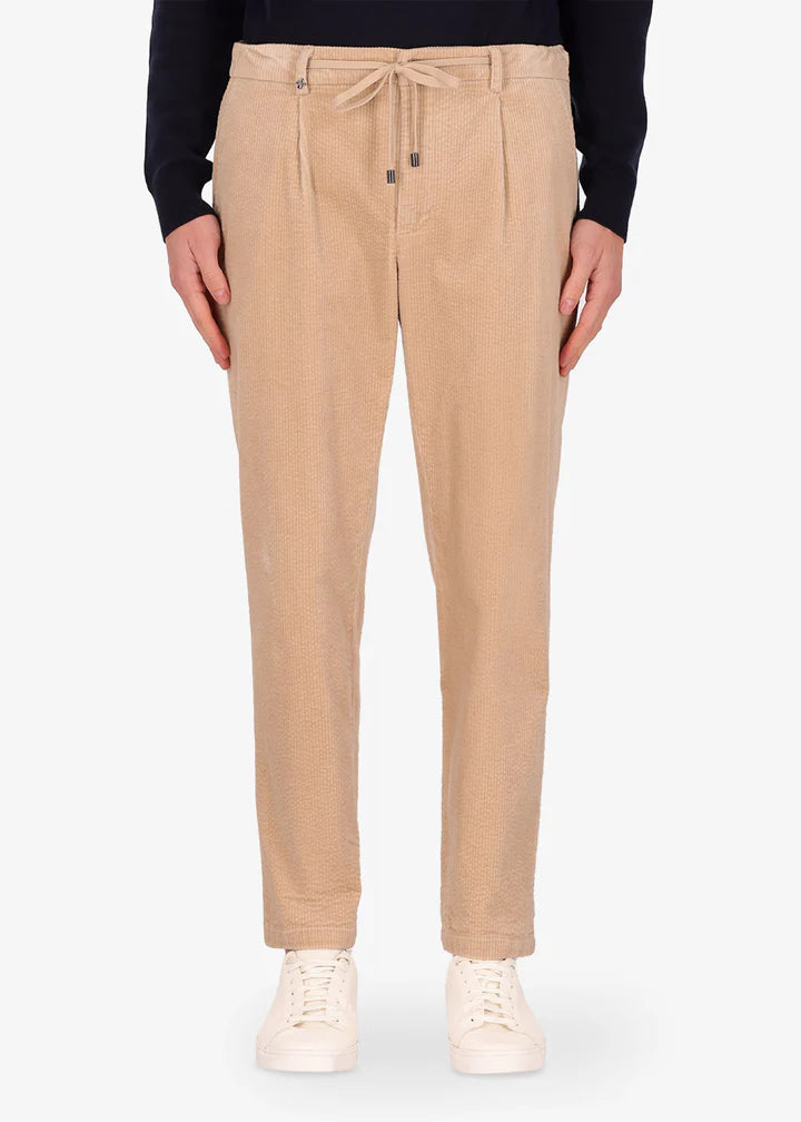 Distretto12 Langa trousers with velvet corduroy effect in sandalwood.