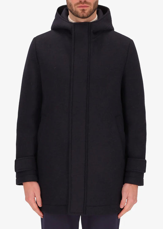 An image of a model wearing Distretto 12 parka coat Carlos in navy.