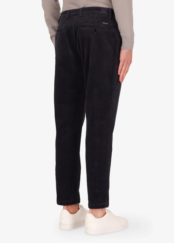 Distretto12 Langa trousers in blue with corduroy velvet effect.
