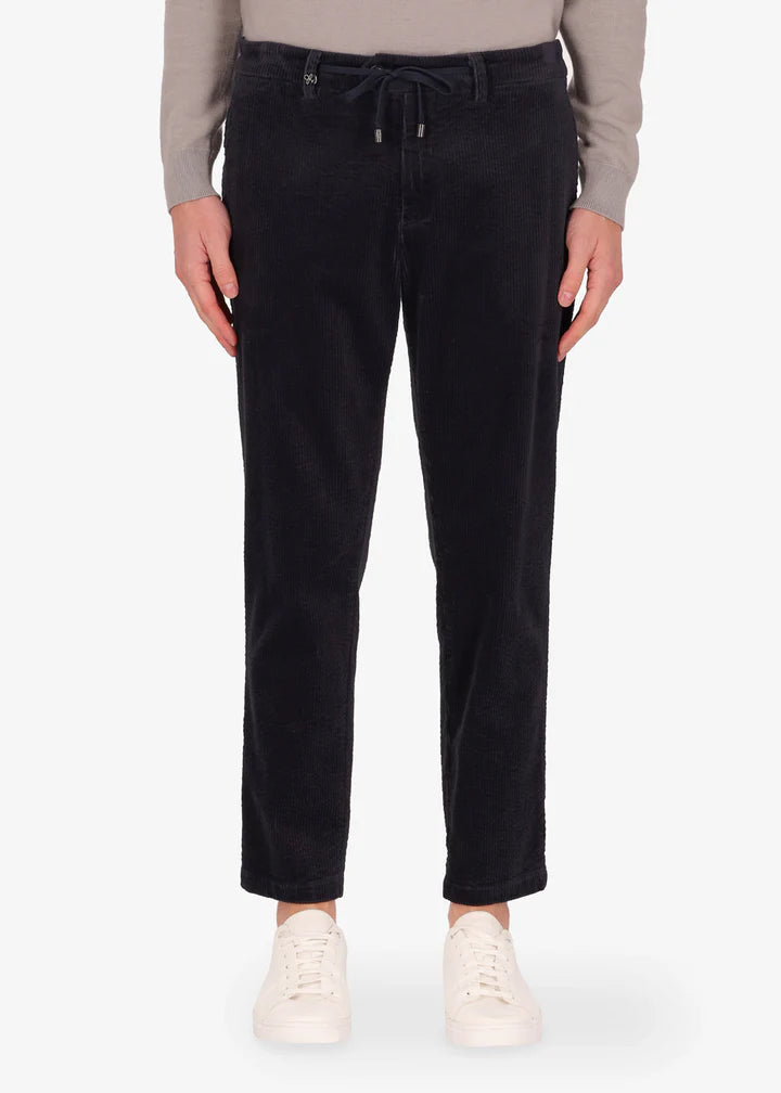 Distretto12 Langa trousers in blue with corduroy velvet effect.
