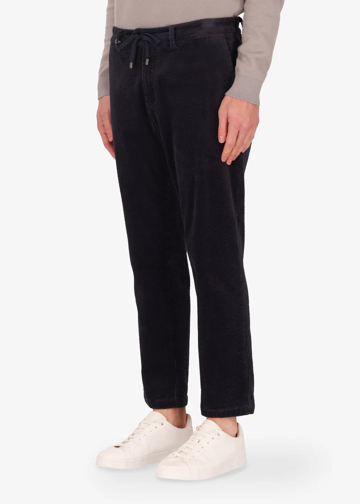Distretto12 Langa trousers in blue with corduroy velvet effect.