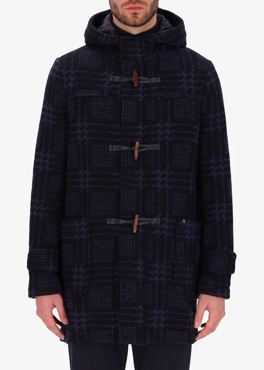 A front facing image of a model wearing Distretto tartan piquard coat in navy.