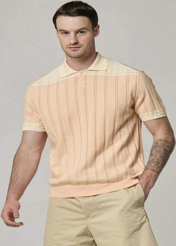 A Wool&Co ribbed polo shirt in cream & sunset.