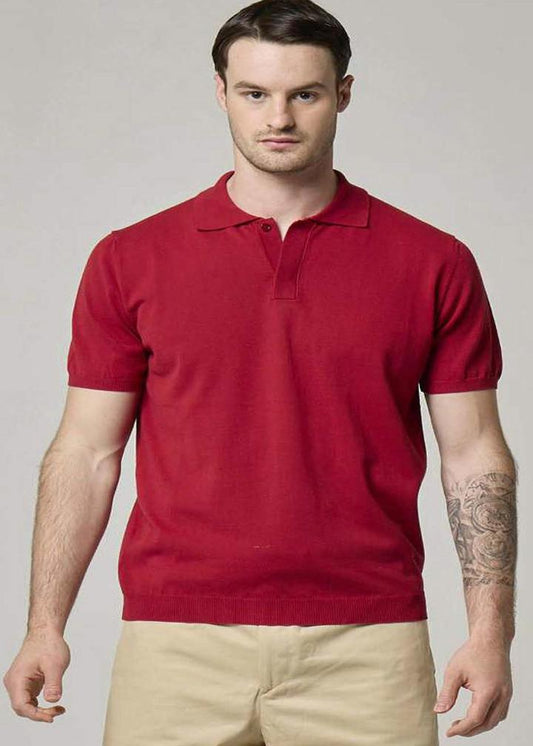 An image of a model wearing red Wool&Co polo.