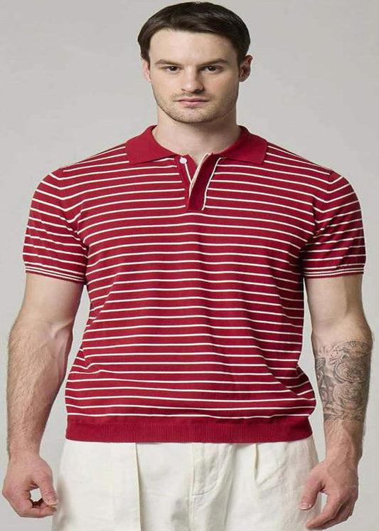 A picture of a model wearing a Wool&Co, striped red & white polo.