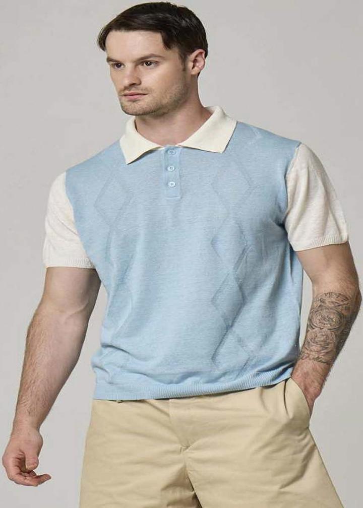 A picture of a model wearing a sky blue, Wool&Co polo with white sleeves.