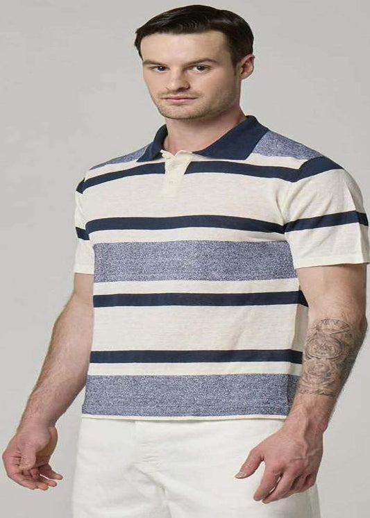 A picture of a model wearing a Wool&Co polo with cream, blue & sky blue accents.
