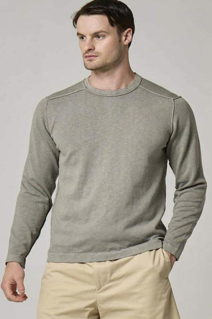 An image of a model wearing a Wool&Co long sleeve cotton t-shirt in grey.