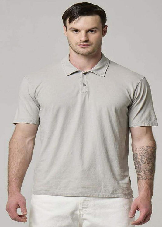 A picture of a model wearing a grey cotton polo.