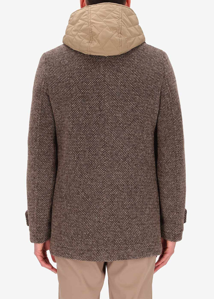 A back image of a model wearing Distretto12 peacoat Blasius in Dove Grey, with a Dove Grey hood.