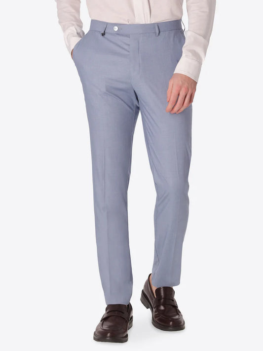 A man wearing Distretto 12 Tailoring Alabastro trousers in sky blue