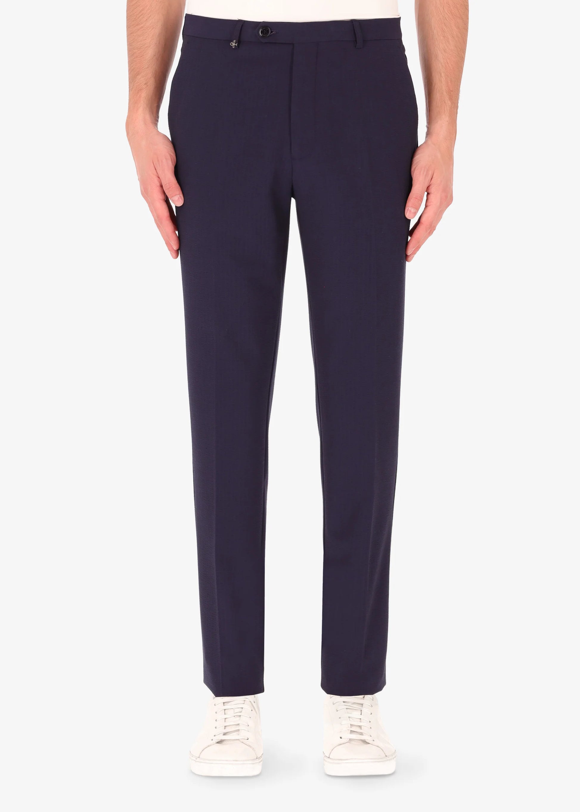 A front facing image of a model wearing Distretto 12 Tailoring tech Firenze Trousers.