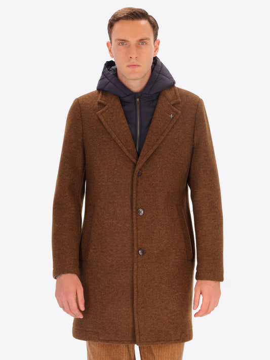 Male model wearing tobacco coloured overcoat by distretto12 with detachable hood