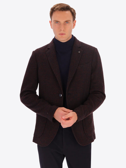 Male model wearing wool blend  jacket in maroon by distretto12 