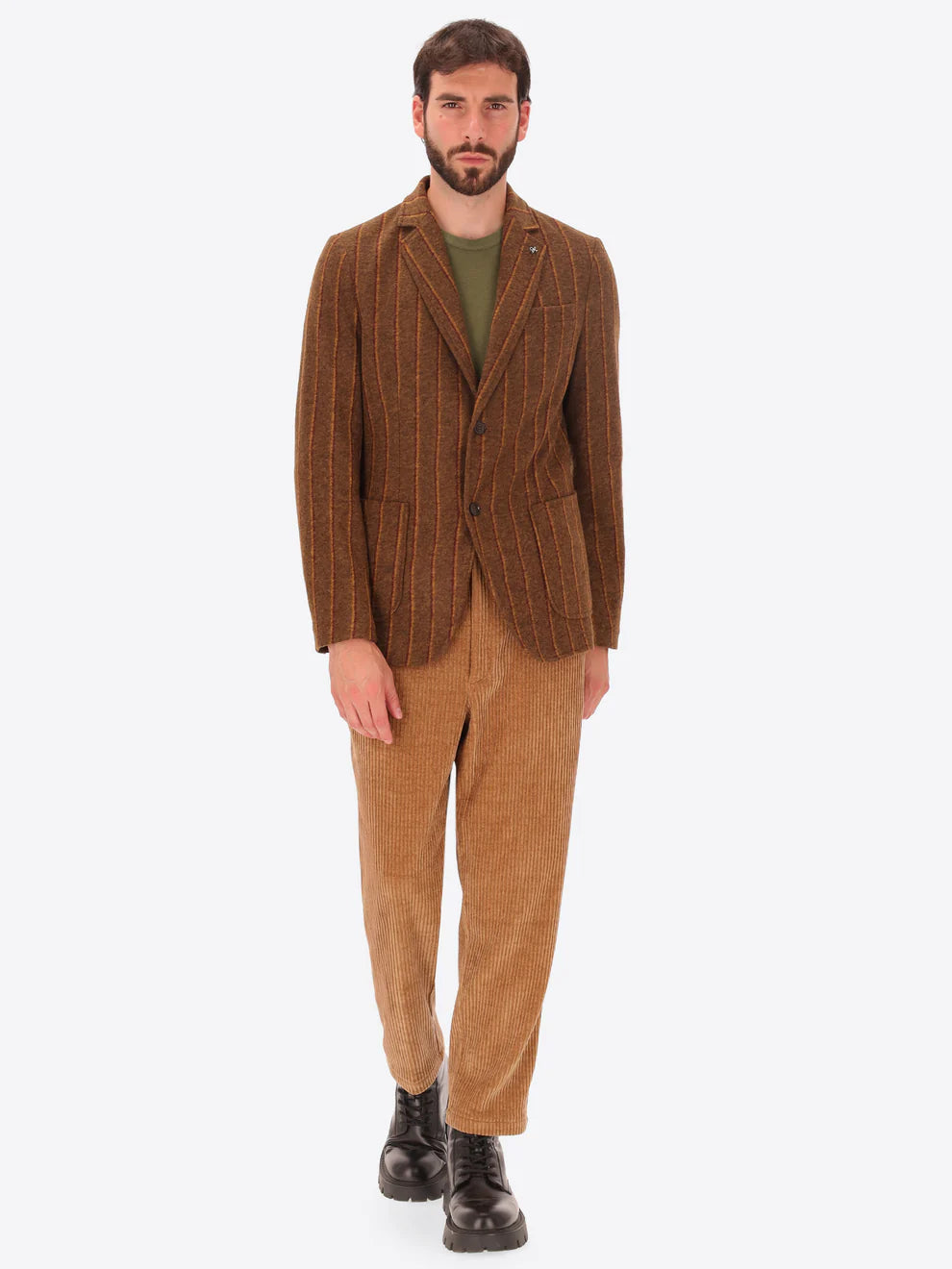 Male model wearing wool blend striped brown jacket by distretto12 with corduroy trousers
