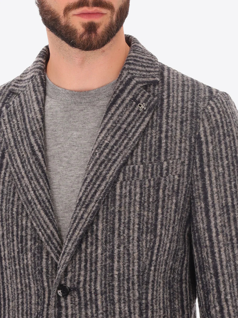 Close up image of male model wearing wool blend striped grey jacket by distretto12 