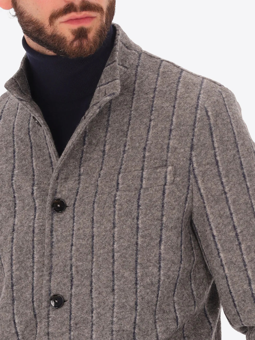 Male model wearing wool blend striped grey coreana style jacket by distretto12 with buttons shown