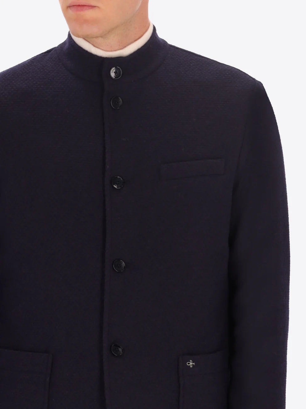 Navy knitted Distretto12 coreana jacket on a male model with buttons shown