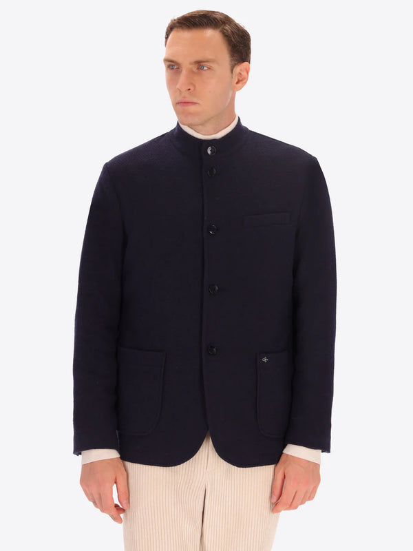 Navy knitted Distretto12 coreana jacket on a male model
