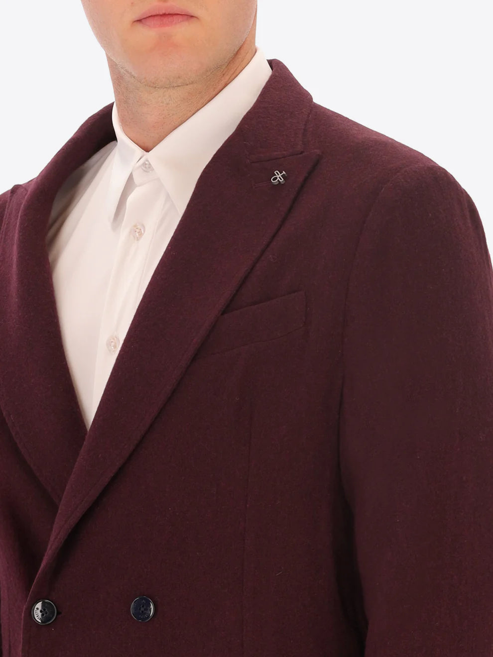 Close up of maroon knitted wool blend Distretto12 double breasted jacket on a male model