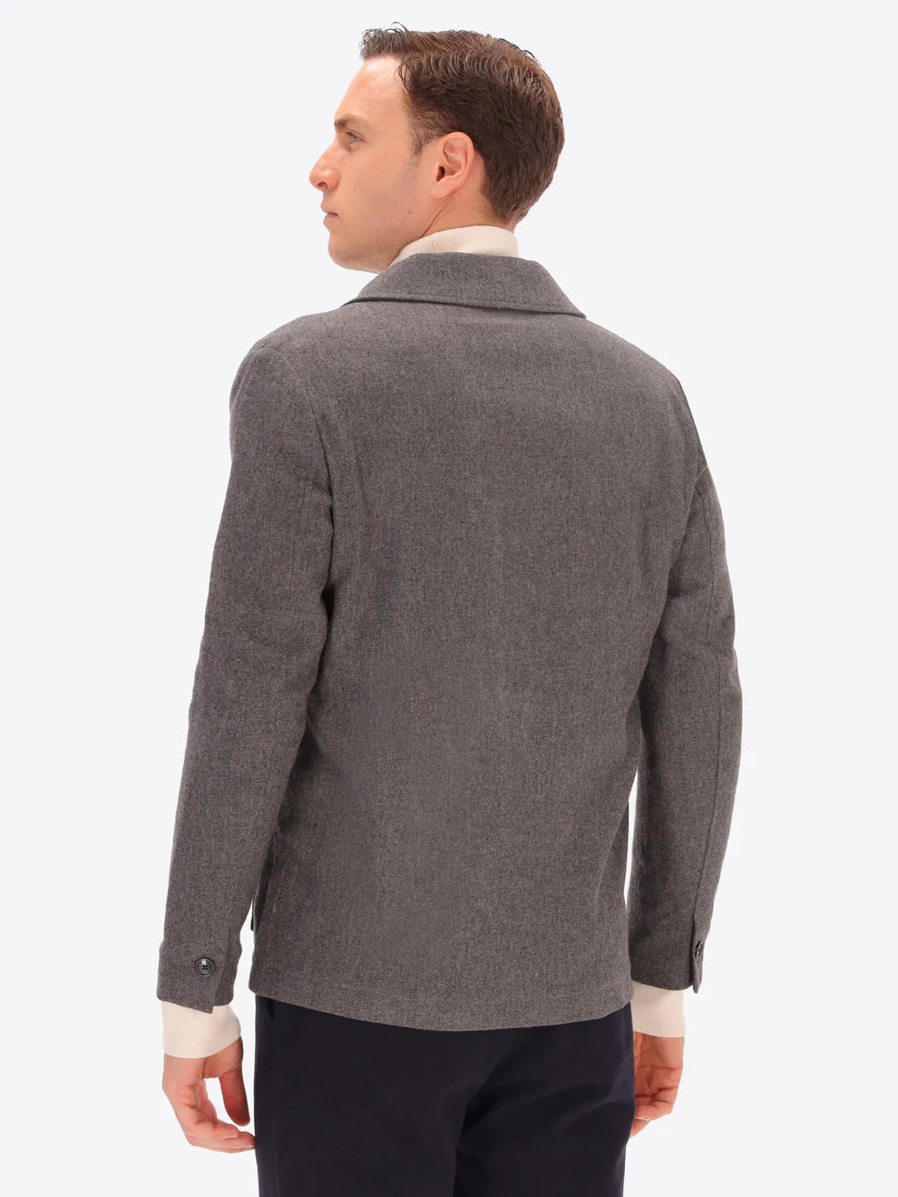 Male model wearing grey blazer by distretto12 with back view