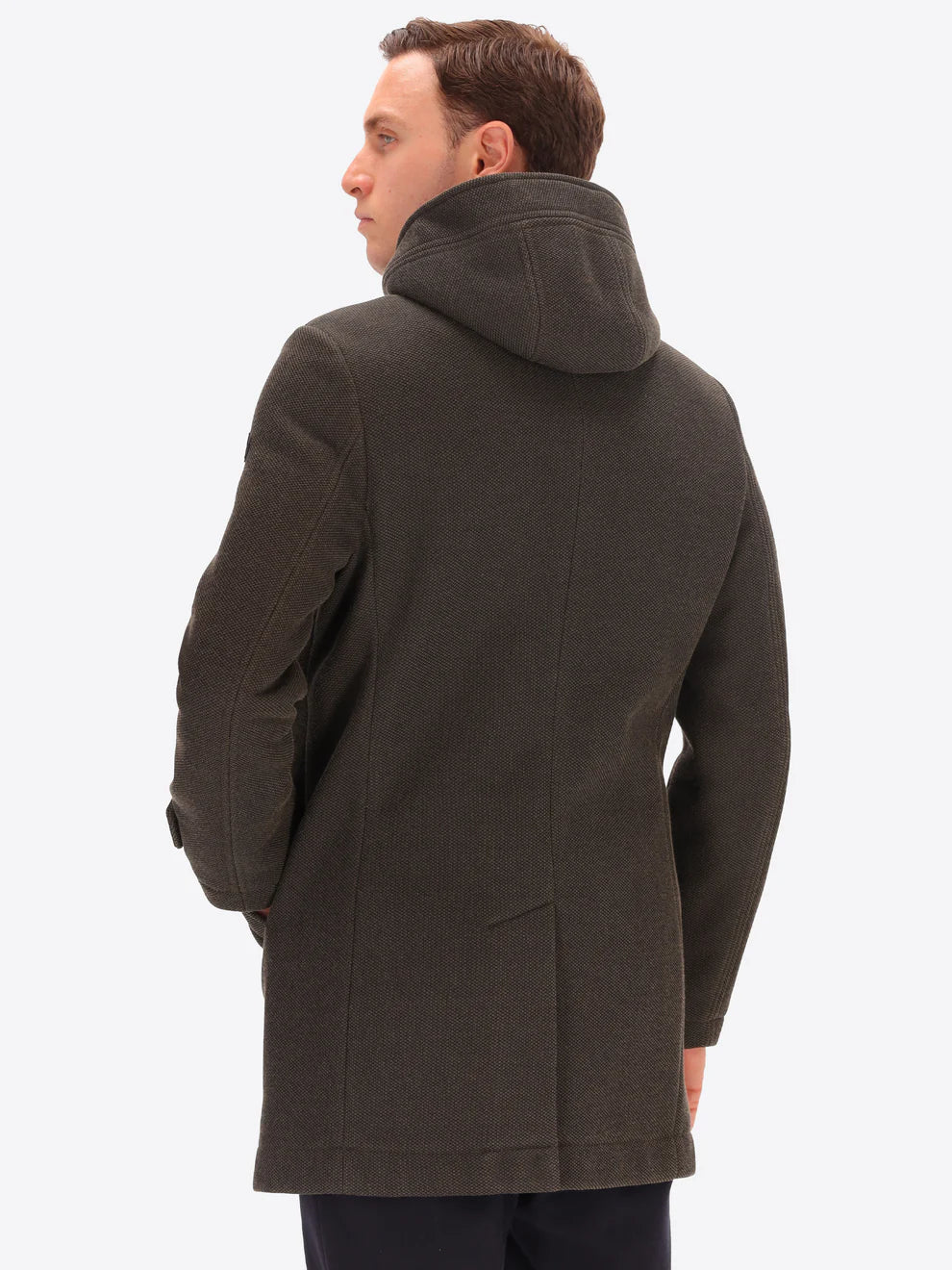 Male model wearing mud coloured parka by distretto12 with back view