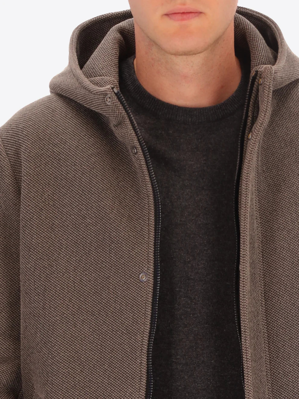 Male model wearing mud coloured parka by distretto12 with coat open