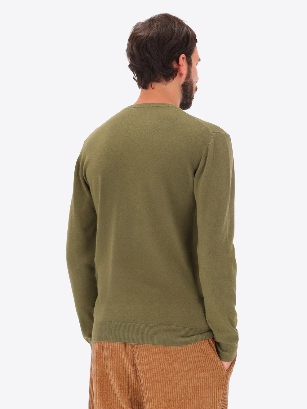 Male model wearing crew neck knitwear by distretto12 in green with back view