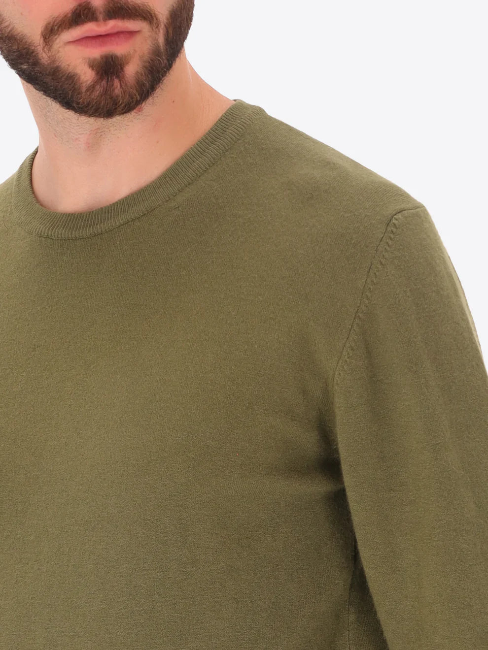 Male model wearing crew neck knitwear by distretto12 in green with close up view