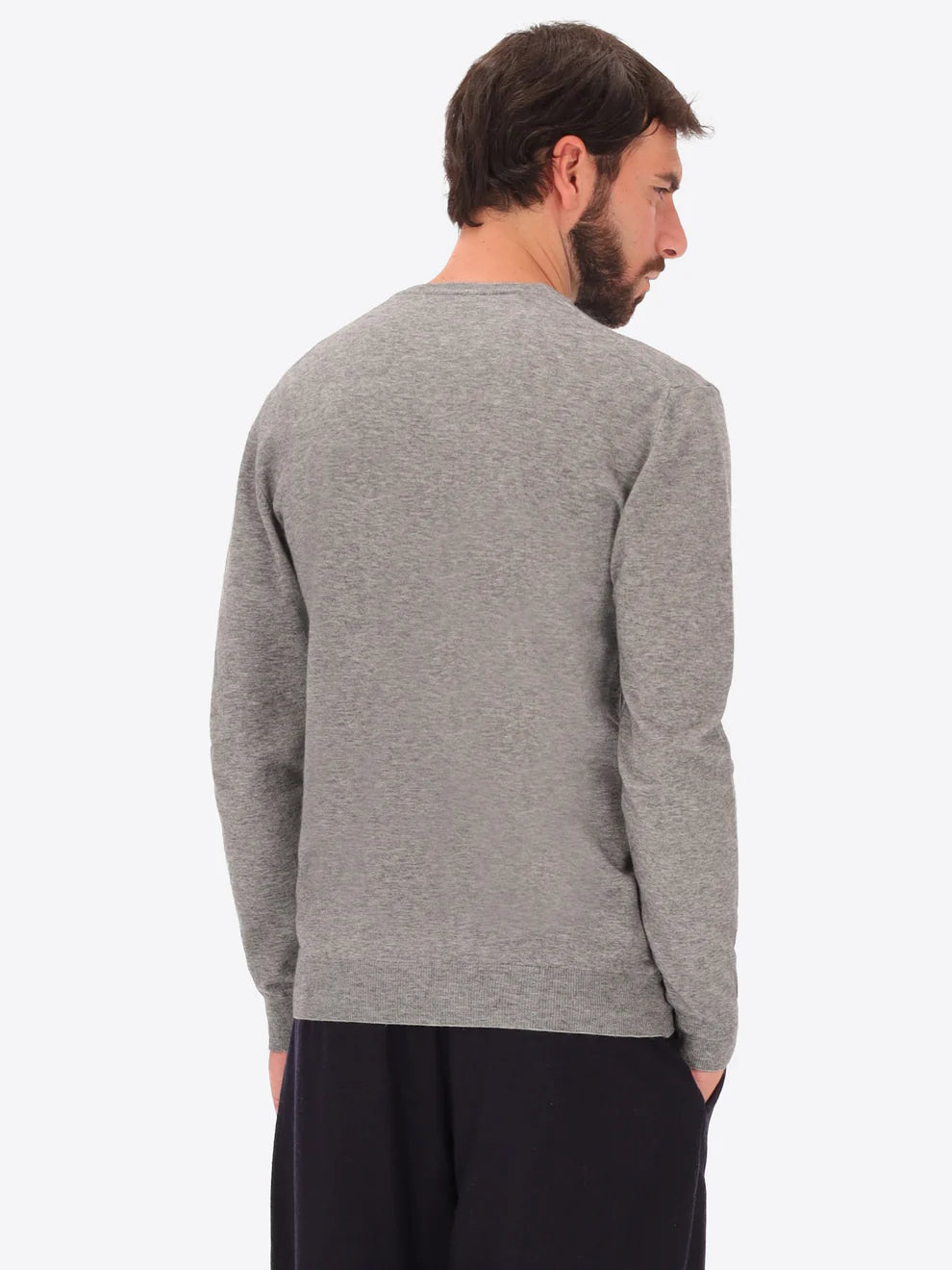 Male model wearing crew neck knitwear by distretto12 in grey with back view