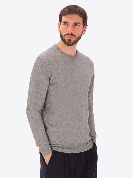 Male model wearing crew neck knitwear by distretto12 in grey
