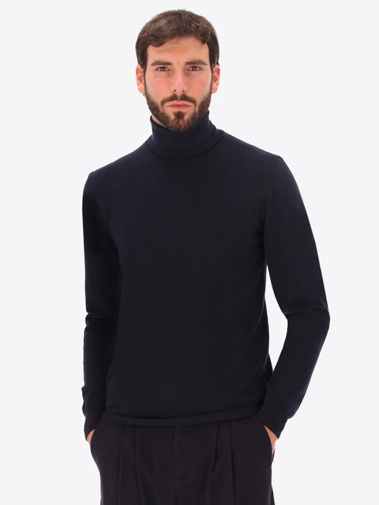 Male model wearing high neck  knitwear by distretto12 in navy
