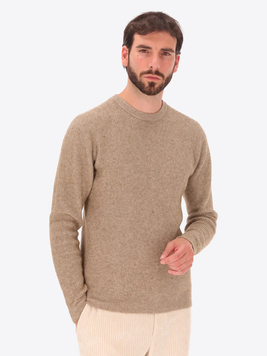 Male model wearing ribbed crew neck knitwear by distretto12 in dove grey