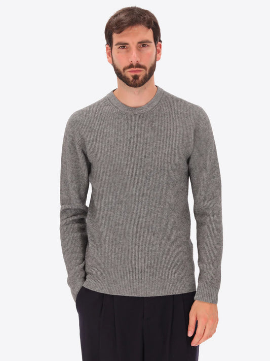 Male model wearing ribbed crew neck knitwear by distretto12 in grey