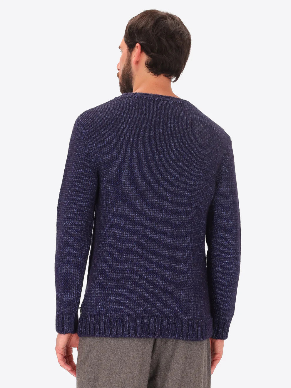 Male model wearing crew neck alpaca blend knitwear by distretto12 in navy with back turned