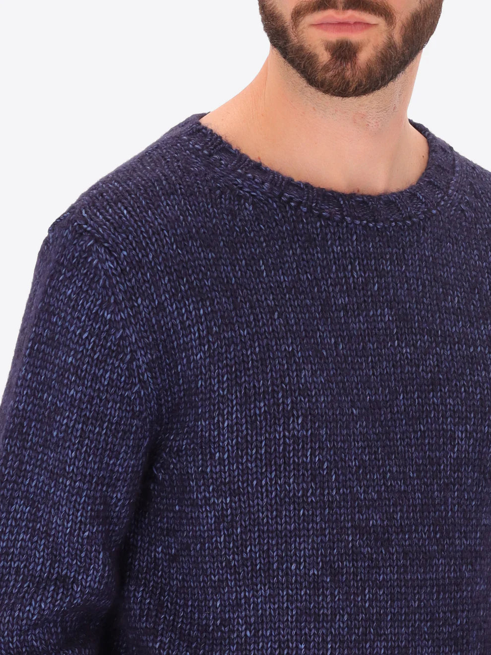 Male model wearing crew neck alpaca blend knitwear by distretto12 in navy with close up view