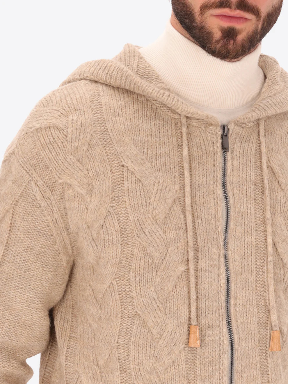 Male model wearing hooded knitwear by distretto12 in dove grey with zip and drawstring shown