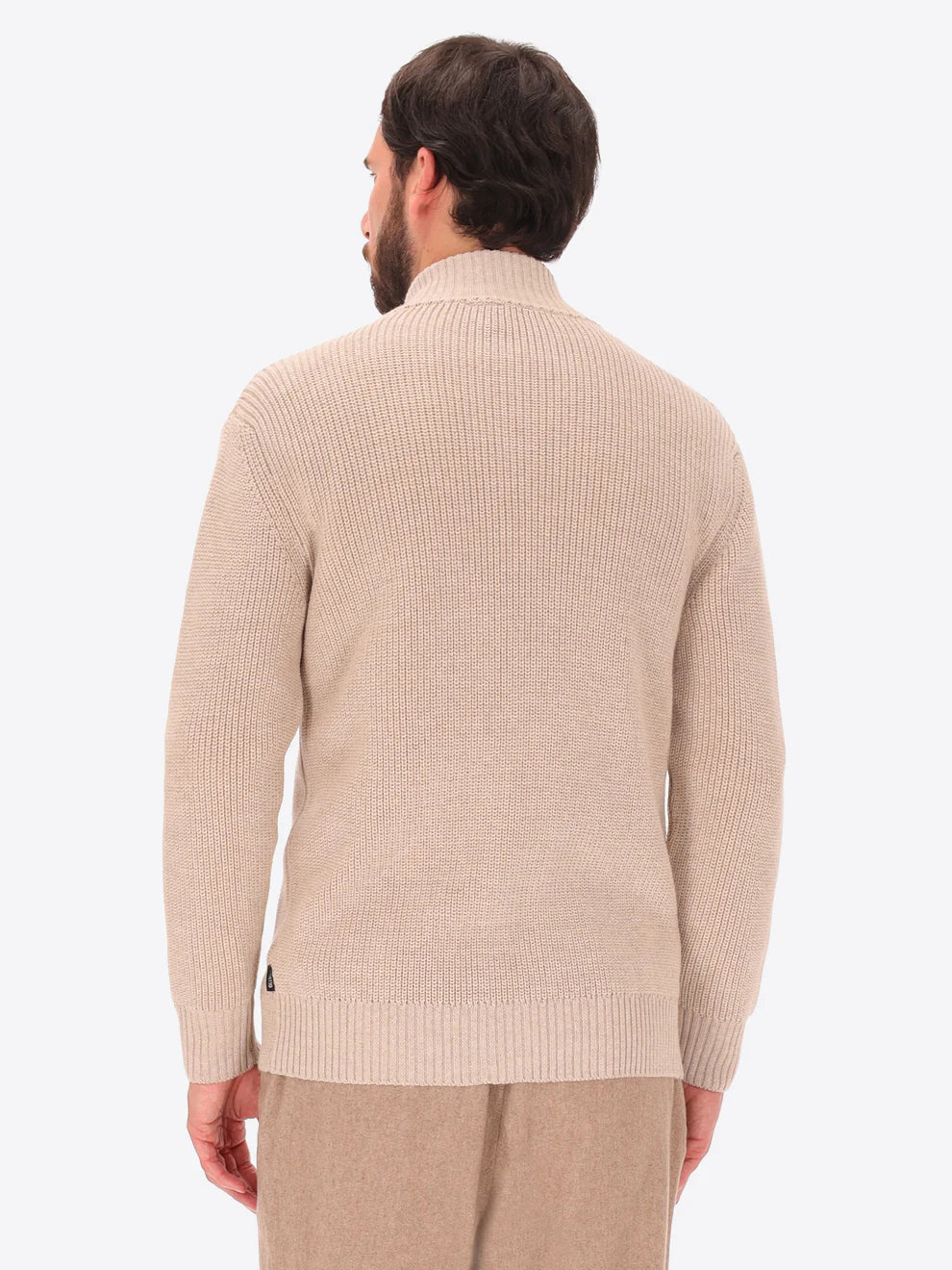 Male model wearing full zip, funnel neck knitwear by distretto12 in dove grey with back turned