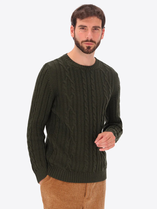Male model wearing crewneck knitwear by distretto12 in dark green