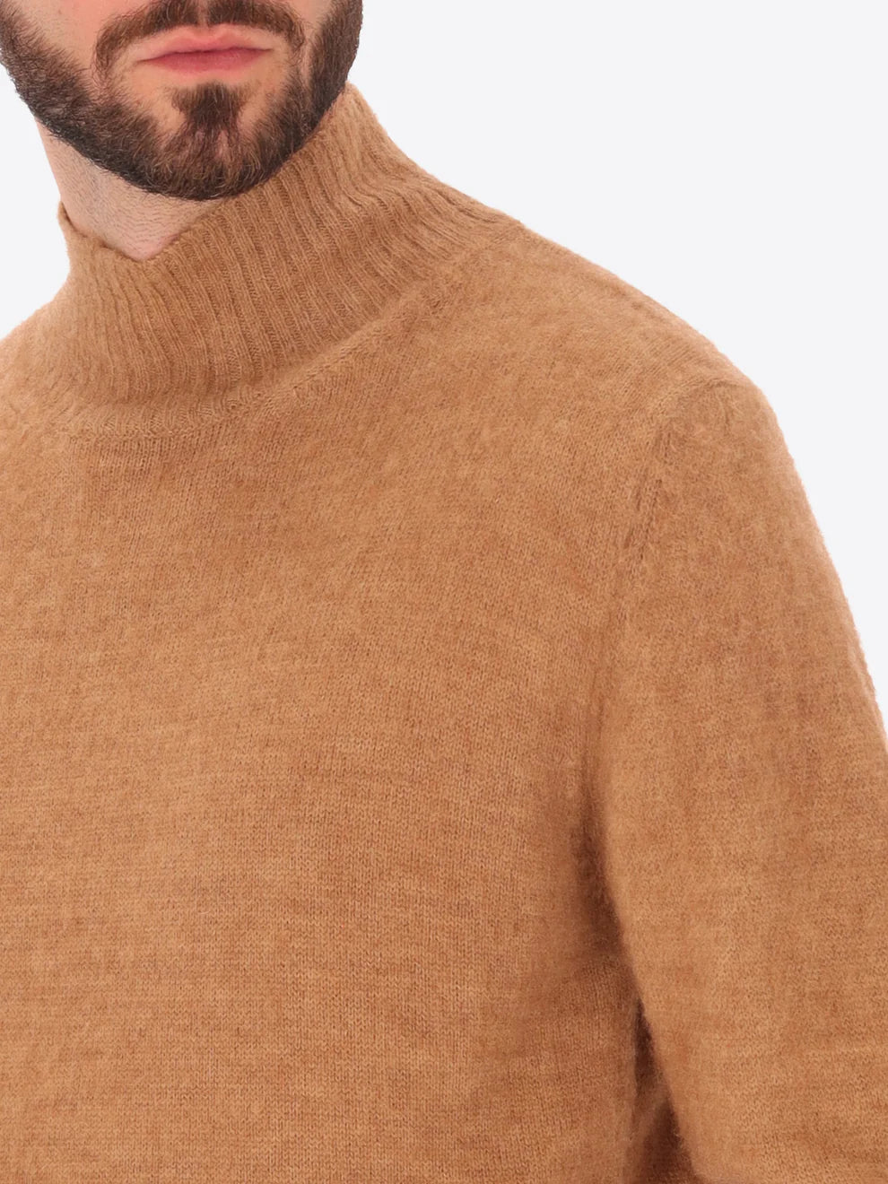 Male model wearing high neck alpaca blend knitwear by distretto12 in tobacco colour with close up view